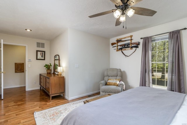 bedroom with visible vents, baseboards, recessed lighting, light wood-type flooring, and a ceiling fan
