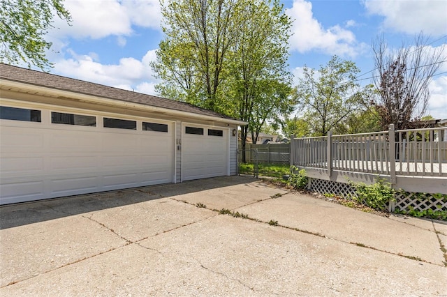 garage with fence
