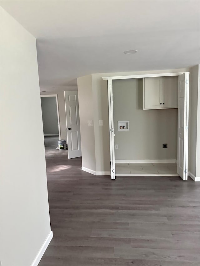laundry room featuring laundry area, wood finished floors, baseboards, electric dryer hookup, and washer hookup