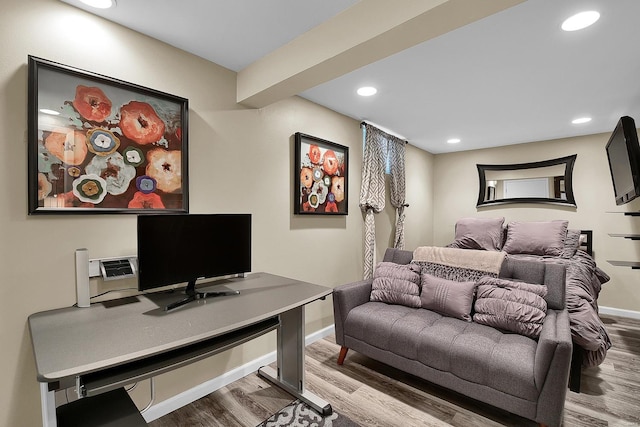 home office with recessed lighting, baseboards, and wood finished floors