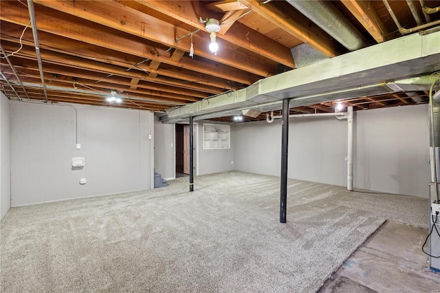 finished basement with carpet flooring