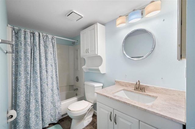 full bath with toilet, shower / bath combo, and vanity
