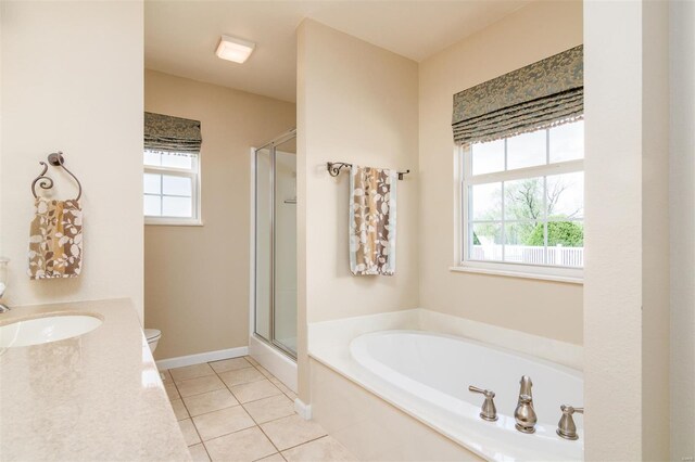 full bathroom with toilet, tile patterned floors, a bath, and a stall shower