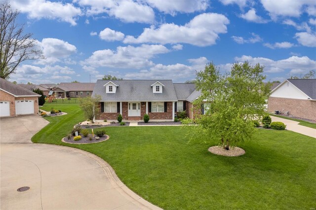 cape cod home featuring roof with shingles, a front yard, a garage, brick siding, and concrete driveway