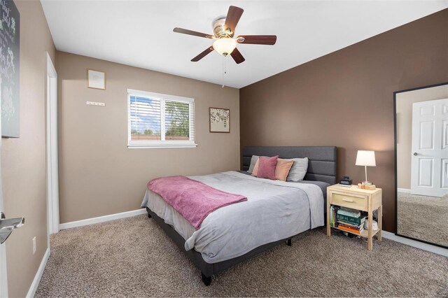 bedroom featuring carpet floors, baseboards, and ceiling fan