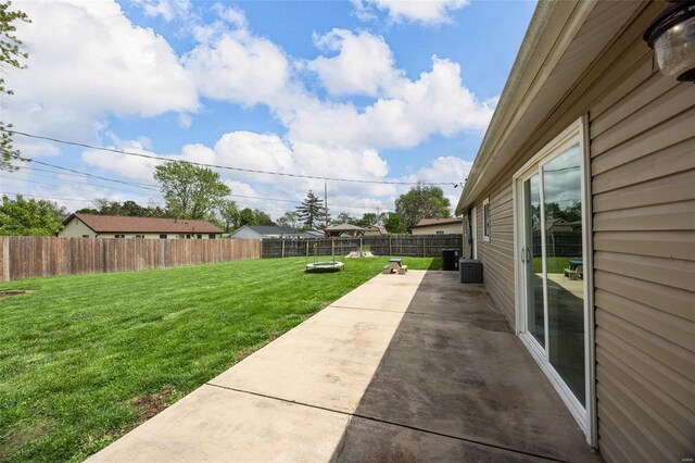 view of yard with a fenced backyard and a patio area