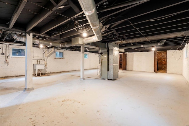 unfinished basement with heating unit
