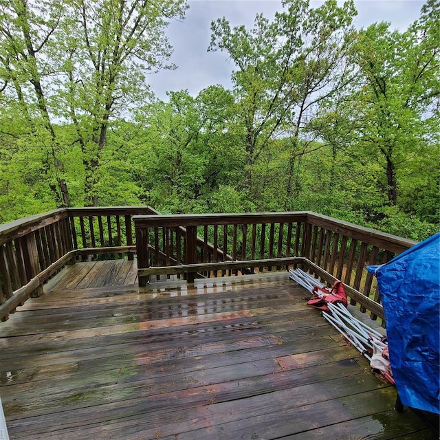 deck featuring a wooded view
