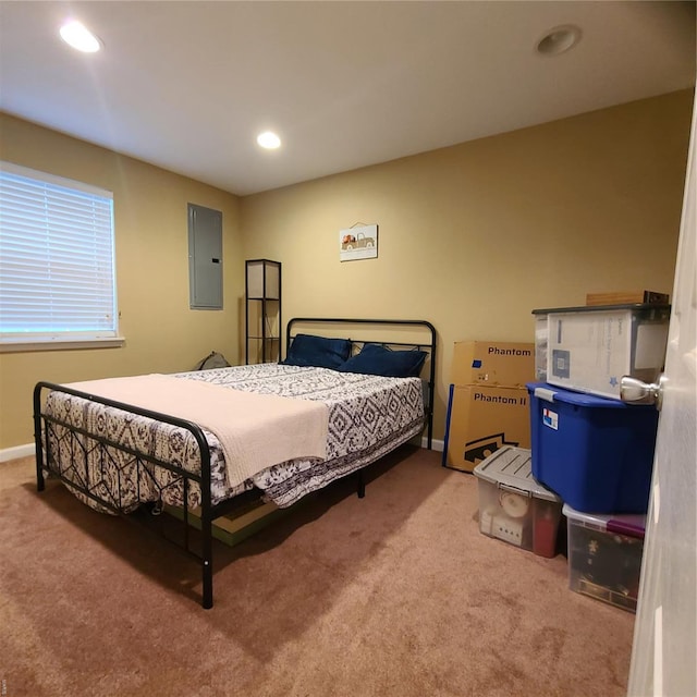 bedroom with baseboards, carpet, recessed lighting, and electric panel