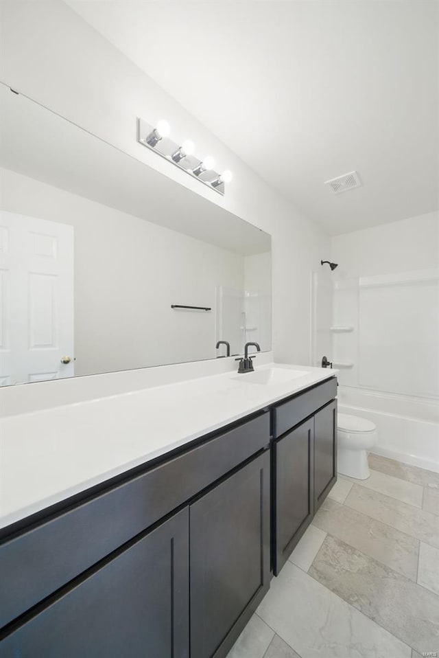 bathroom featuring shower / bath combination, vanity, toilet, and visible vents