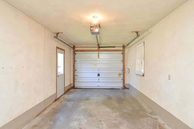 garage featuring a garage door opener