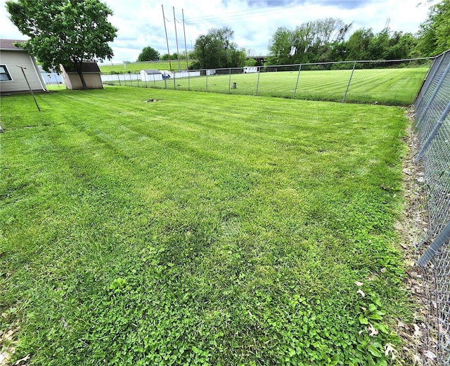 view of yard featuring fence