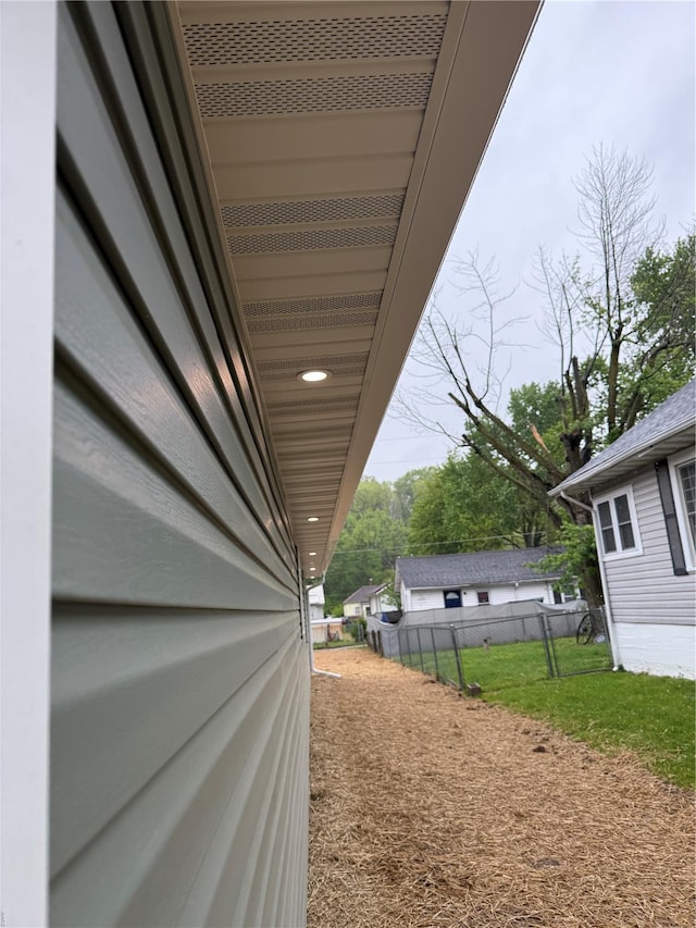 view of property exterior with fence