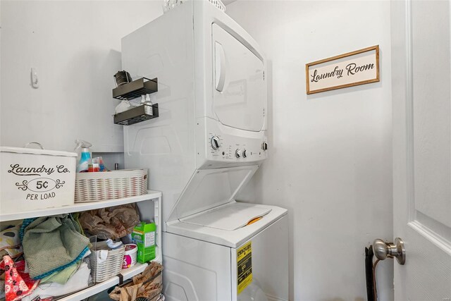 laundry area with laundry area and stacked washing maching and dryer