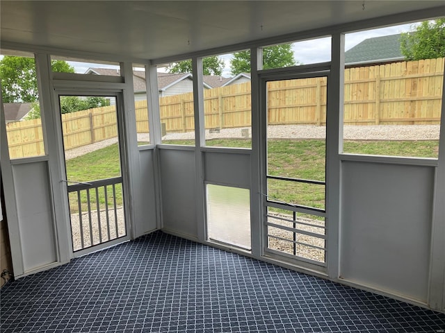 view of unfurnished sunroom