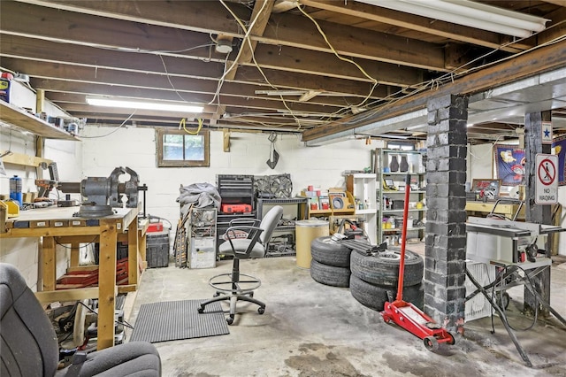 basement with a workshop area