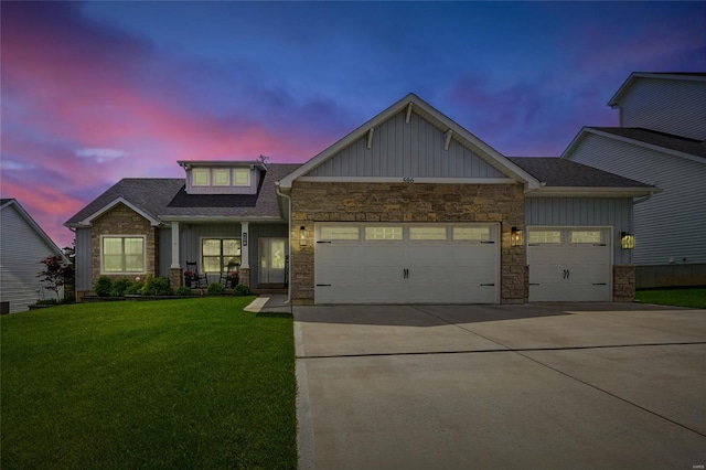 craftsman house with concrete driveway, board and batten siding, an attached garage, and stone siding
