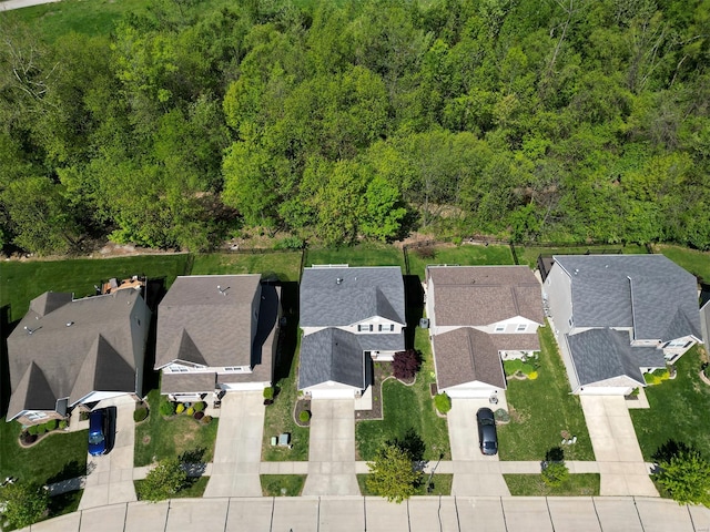 aerial view with a forest view and a residential view