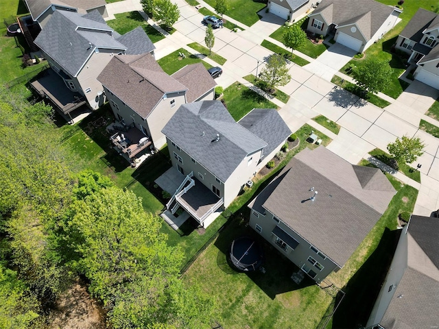 birds eye view of property with a residential view