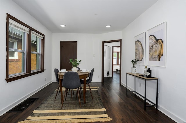 dining space featuring recessed lighting, baseboards, dark wood finished floors, and visible vents