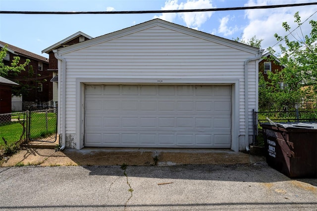 detached garage with fence
