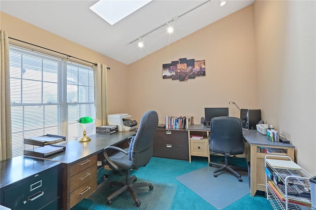 office with dark carpet, lofted ceiling, and track lighting