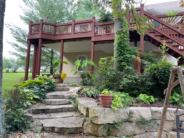 exterior space featuring stairway and a deck
