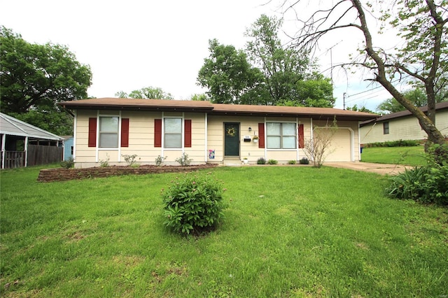ranch-style house featuring an attached garage, a front yard, and concrete driveway
