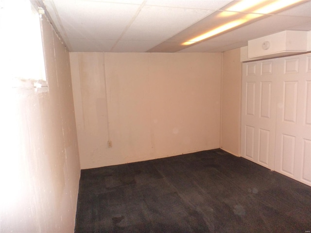 finished basement featuring dark wood finished floors