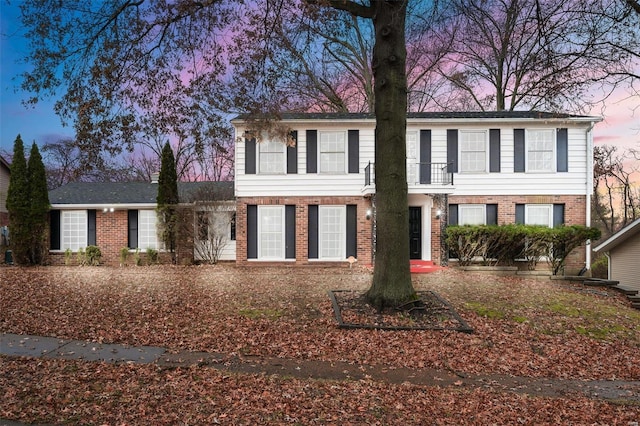 view of front of home with brick siding
