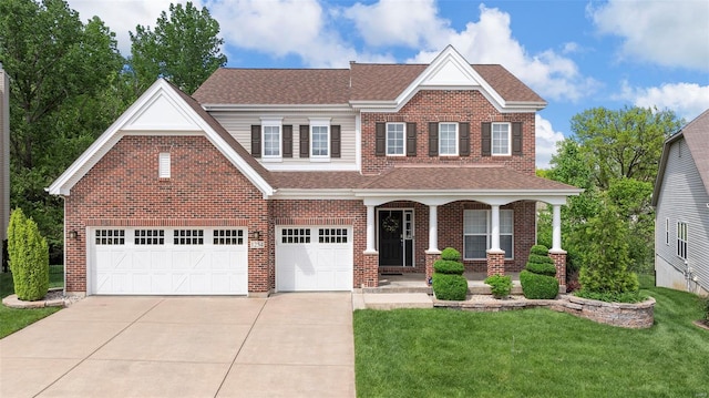 view of front of home with a shingled roof, concrete driveway, a porch, and a front lawn
