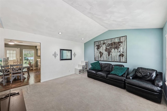 living room with baseboards, recessed lighting, carpet, and lofted ceiling