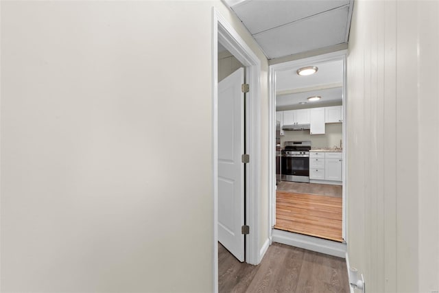 hallway featuring wood finished floors