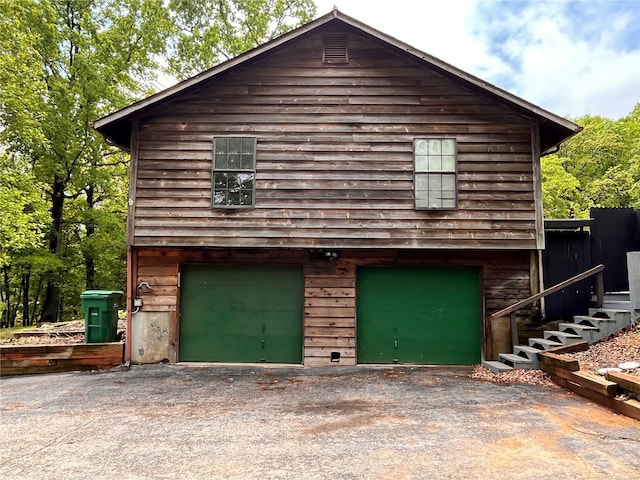 garage with driveway