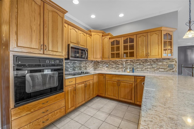 kitchen featuring light tile patterned flooring, ornamental molding, black appliances, and tasteful backsplash