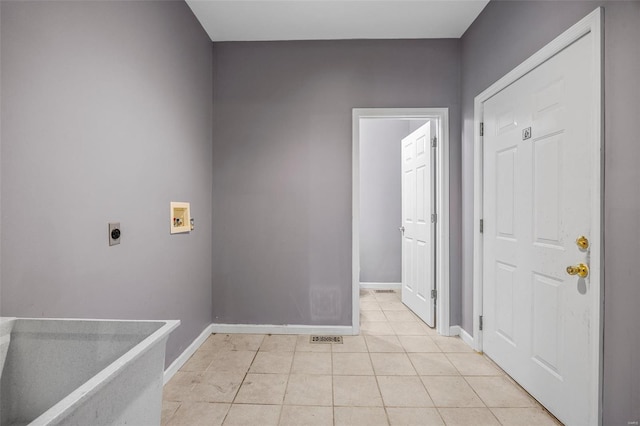 laundry room with laundry area, washer hookup, baseboards, and hookup for an electric dryer