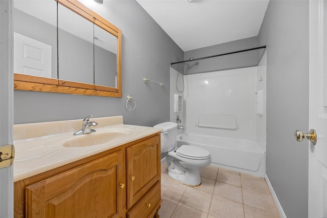 bathroom featuring vanity, toilet, baseboards, shower / bathing tub combination, and tile patterned floors