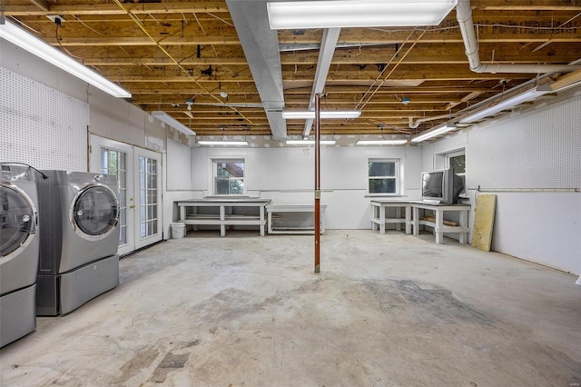 below grade area with washing machine and clothes dryer