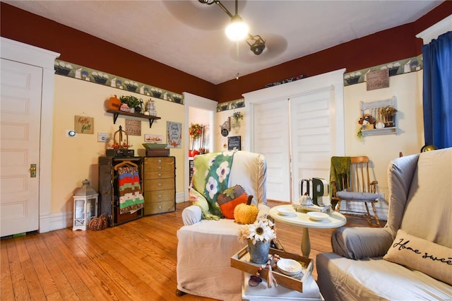 sitting room featuring hardwood / wood-style flooring