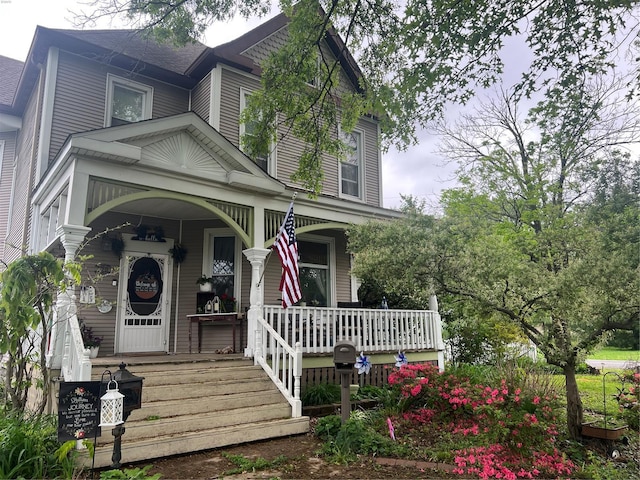 victorian home featuring a porch