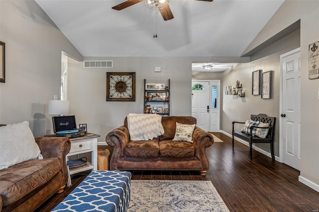living room with vaulted ceiling, wood finished floors, a ceiling fan, and visible vents