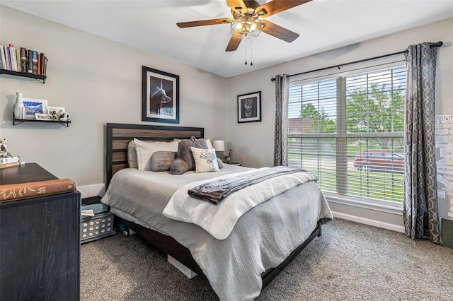 bedroom with carpet, baseboards, and ceiling fan