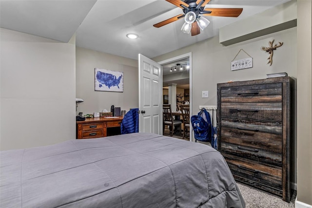 bedroom with ceiling fan and carpet flooring
