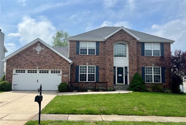 colonial inspired home featuring a shingled roof, an attached garage, a front lawn, brick siding, and concrete driveway
