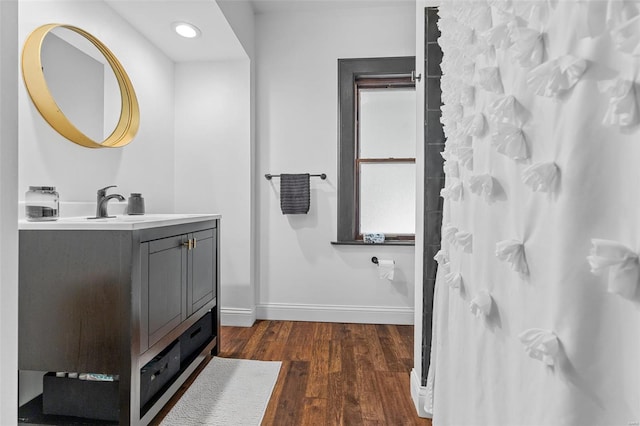 full bath with vanity, recessed lighting, baseboards, wood finished floors, and a shower with curtain