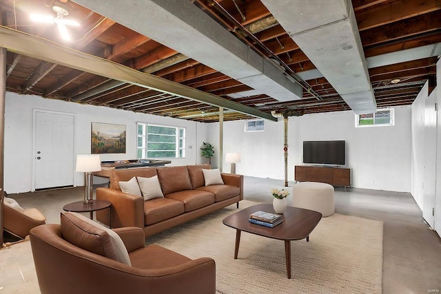 living area featuring concrete flooring