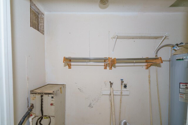 washroom with water heater