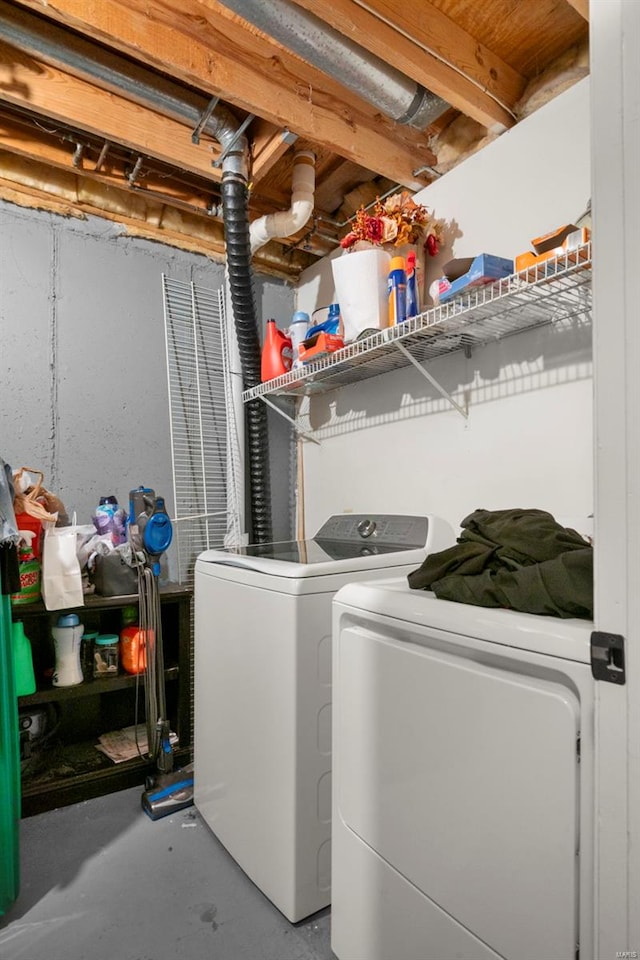laundry area with laundry area and independent washer and dryer