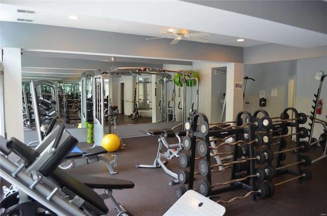 exercise room with a ceiling fan and recessed lighting