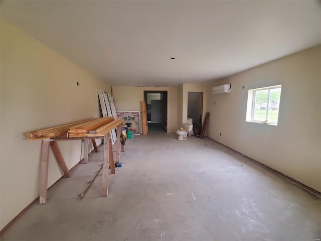 unfurnished living room with a wall mounted AC
